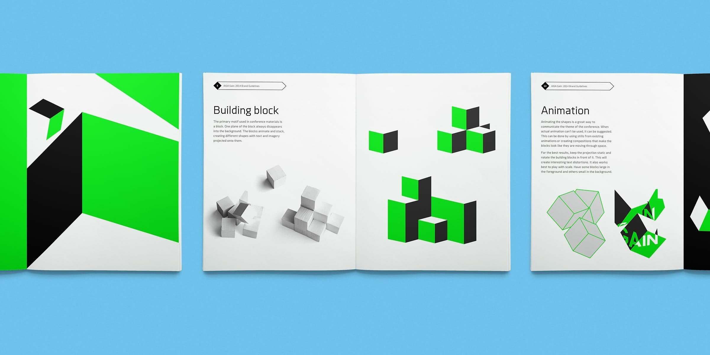 An open book against a blue background shows pages with geometric designs in green, black, and white. The left page displays 3D cubes; the middle spread features text titled "Building block" with 3D shapes; the right spread is titled "Animation" with 3D green/black cubes.