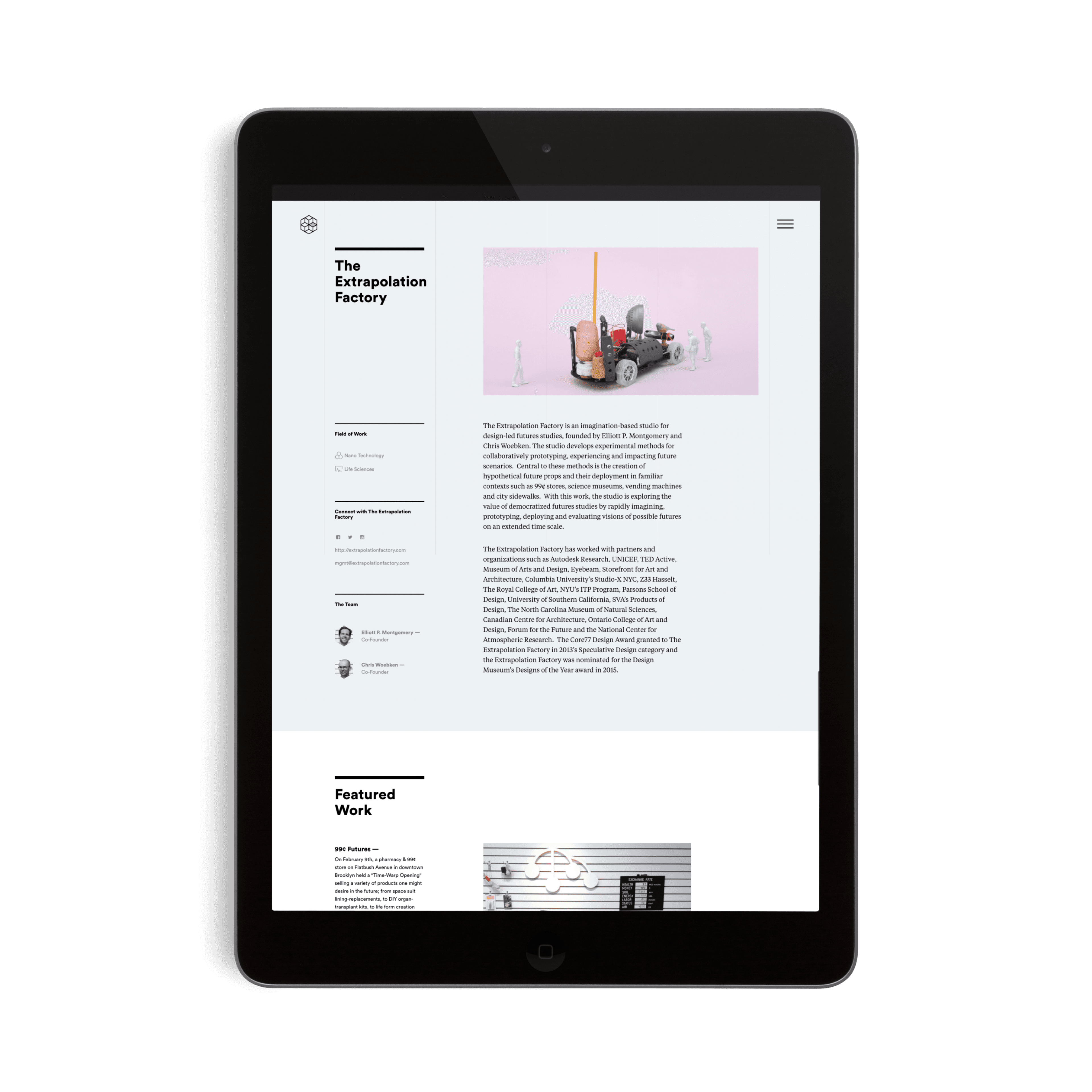 A black tablet is displaying a webpage from "The Extrapolation Factory." The page includes text descriptions and images, one of which shows a miniature futuristic scene with tiny figures and equipment. The "Featured Work" section is visible at the bottom of the screen.