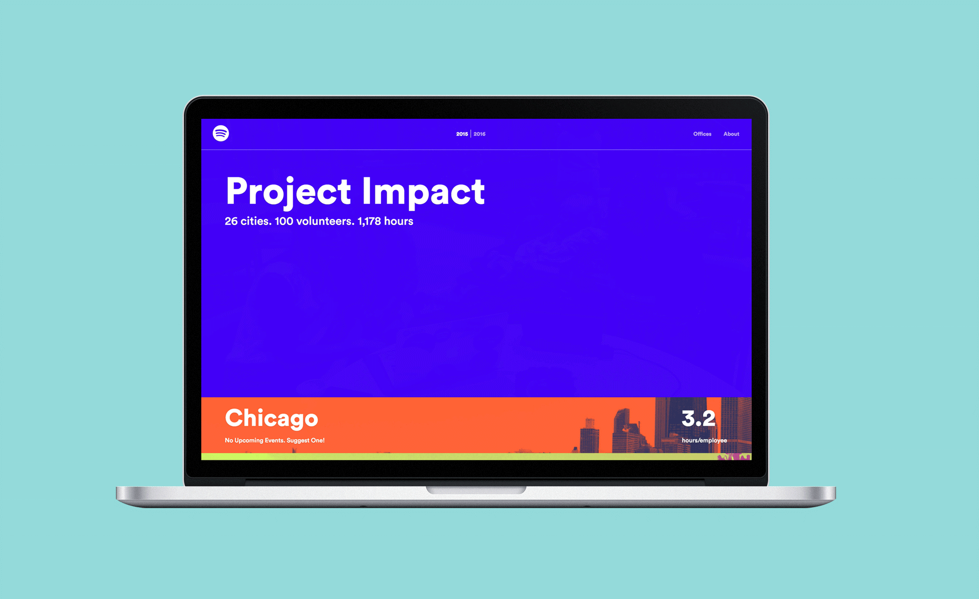 A laptop displaying a website with a blue and orange color scheme on a light blue background. The screen shows text stating "Project Impact," details related to the project, and the city "Chicago" along with a skyline silhouette and a numeric value of 3.2.