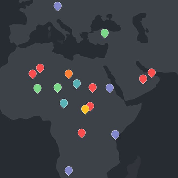 A dark-themed world map features various colored location pins concentrated in Africa, the Middle East, and Southern Europe. Pins are red, green, blue, yellow, light blue, and orange, indicating different points of interest or data.
