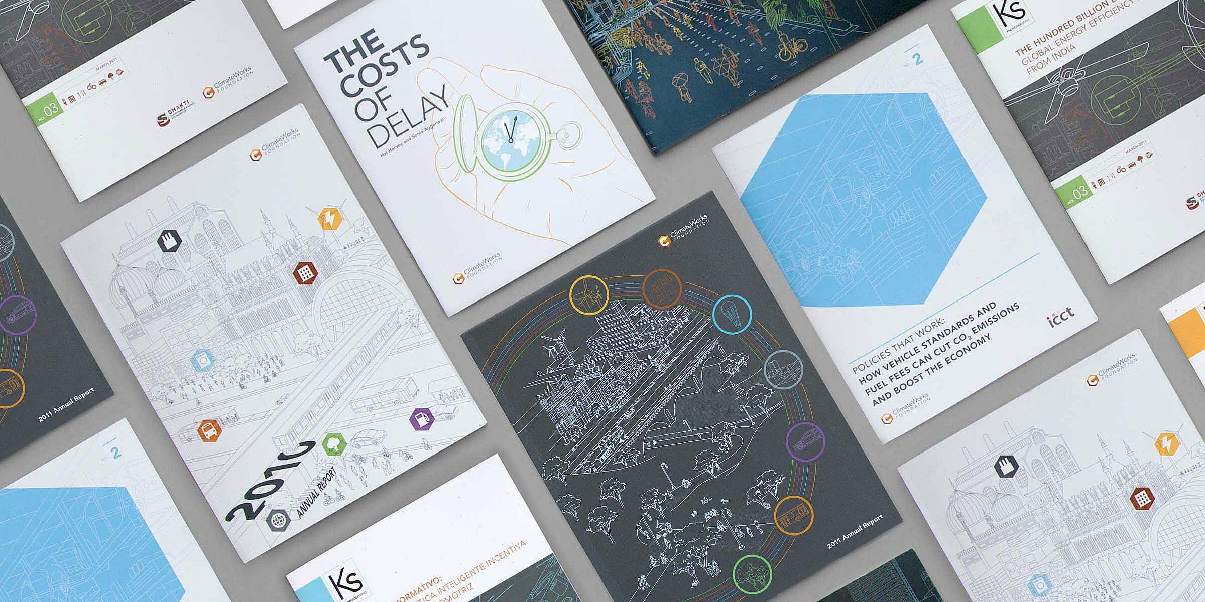 An assortment of brochures and booklets laid out on a flat surface. Each cover features various designs, including illustrations, text, diagrams, and colorful graphics. The publications appear to be related to infrastructure, planning, and project management.