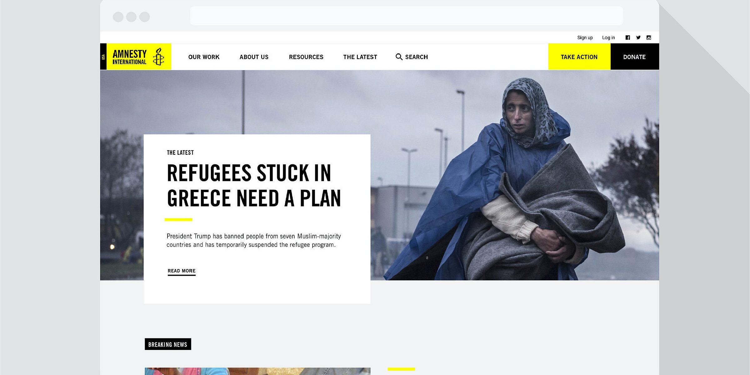 A webpage from Amnesty International. The headline reads "REFUGEES STUCK IN GREECE NEED A PLAN." Below is an image of a person in warm clothing sitting outdoors. Additional news headlines and navigation options are visible on the page.