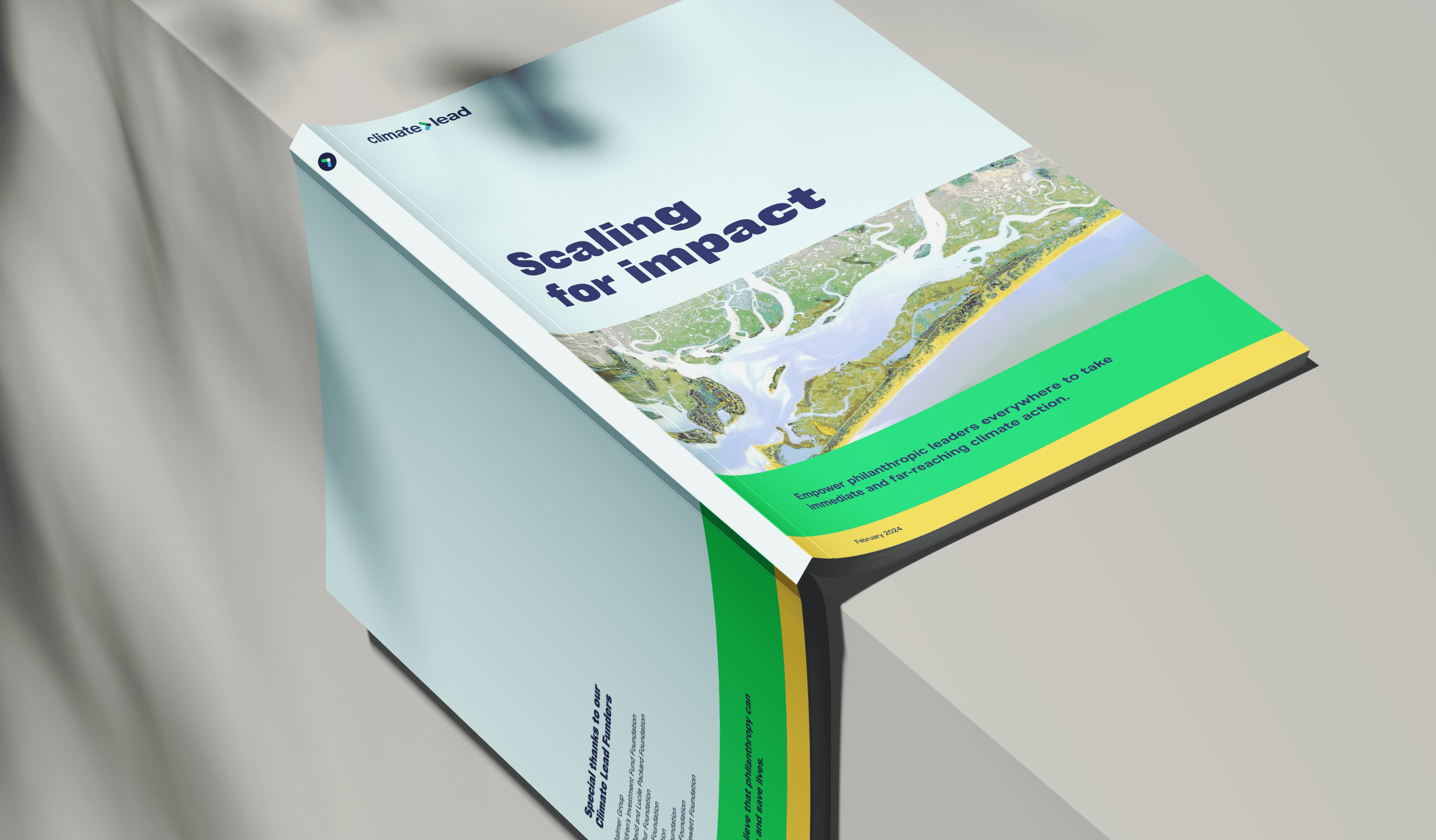 A book titled "Scaling for Impact" is placed partially over a cusp. The cover features a map-like illustration with rivers and green land areas. The background is light blue, and additional text can be seen partially on the book's spine and back cover.