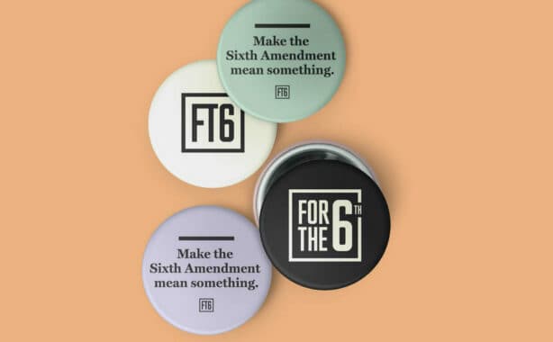 Four circular pins arranged on an orange background display messages supporting the Sixth Amendment. Two pins read "Make the Sixth Amendment mean something," and two have the acronym "FT6" and "For the 6th." The pins are in shades of white, black, purple, and mint green.